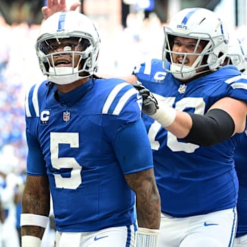 Sep 8, 2024; Indianapolis, Indiana, USA; Indianapolis Colts quarterback Anthony Richardson (5) celebrates a touchdown during the second half agains the Houston Texans at Lucas Oil Stadium. Mandatory Credit: Marc Lebryk-Imagn Images