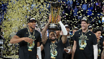 Dec 17, 2024; Las Vegas, Nevada, USA; Milwaukee Bucks forward Giannis Antetokounmpo (34), guard Damian Lillard (0) and center Brook Lopez (11) celebrate after winning the Emirates NBA Cup championship game against the Oklahoma City Thunder at T-Mobile Arena. Mandatory Credit: Kyle Terada-Imagn Images