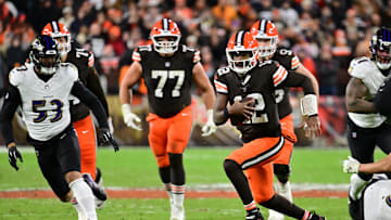 Nov 16, 2025; Cleveland, Ohio, USA; Cleveland Browns quarterback Shedeur Sanders (12) runs for a gain during the fourth quarter against the Baltimore Ravens at Huntington Bank Field. Mandatory Credit: Ken Blaze-Imagn Images