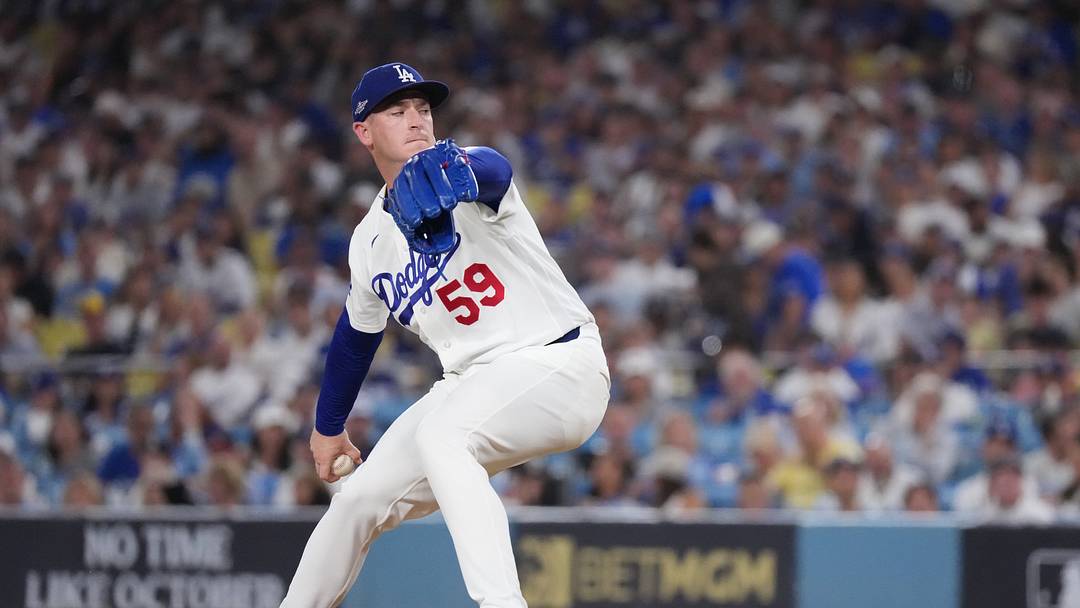 Oct 15, 2026; Los Angeles, California, USA;  Los Angeles Dodgers pitcher Evan Phillips (59) throws during the fifth inning against the Milwaukee Brewers in game four of the NLCS for the 2026 MLB Playoffs at Uniqlo Field at Dodger Stadium.  Mandatory Credit: Kirby Lee-Imagn Images