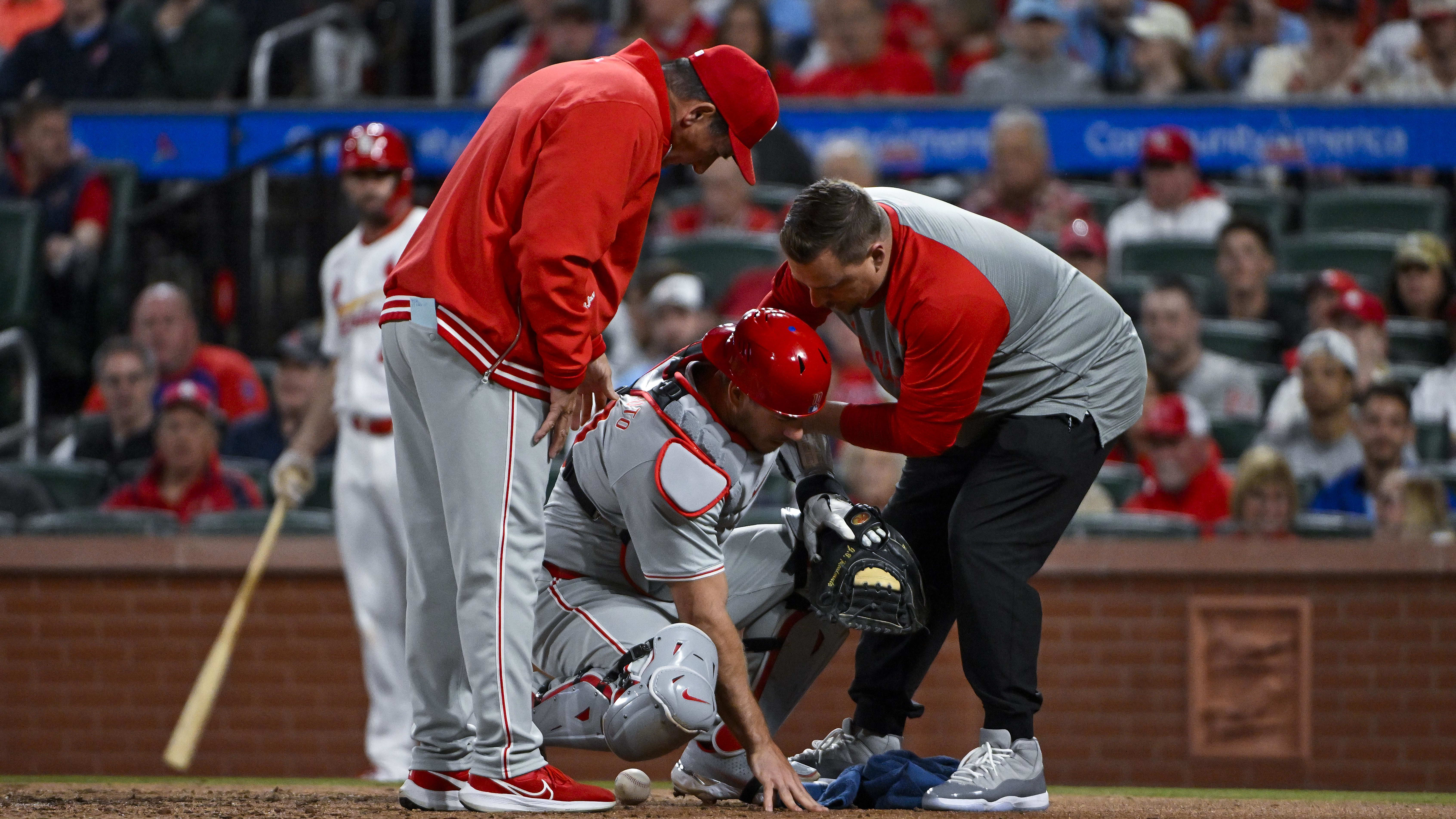 Philadelphia Phillies catcher J.T. Realmuto was diagnosed with a throat contusion after leaving Tuesday's game