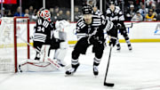 Apr 11, 2025; Newark, New Jersey, USA; New Jersey Devils defenseman Brett Pesce (22) pursues a loose puck during the third period against the Pittsburgh Penguins at Prudential Center. Mandatory Credit: John Jones-Imagn Images