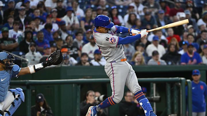 Apr 26, 2025; Washington, District of Columbia, USA; New York Mets third baseman Mark Vientos (27) singles against the Washington Nationals during the ninth inning at Nationals Park. Mandatory Credit: Brad Mills-Imagn Images