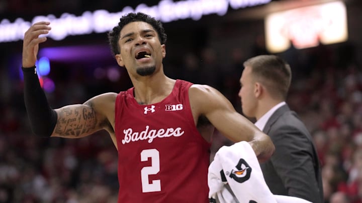 Wisconsin guard Nick Boyd (2) tries to fire up the crowd during the second half of their game Saturday, December 6, 2025 at the Kohl Center in Madison, Wisconsin. Wisconsin beat Marquette 96-76.
