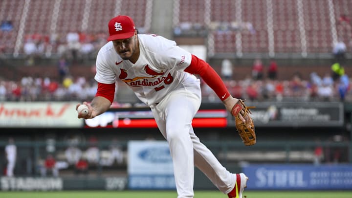 Jun 24, 2025; St. Louis, Missouri, USA;  St. Louis Cardinals third baseman Nolan Arenado (28) fields a ground ball against the Chicago Cubs during the fifth inning at Busch Stadium. Mandatory Credit: Jeff Curry-Imagn Images