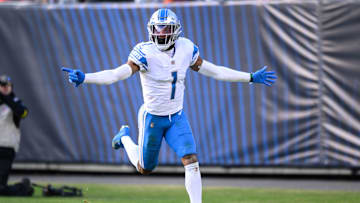 Nov 13, 2022; Chicago, Illinois, USA; Detroit Lions cornerback Jeff Okudah (1) celebrates his interception for a touchdown in the fourth quarter against the Chicago Bears at Soldier Field. Mandatory Credit: Daniel Bartel-Imagn Images