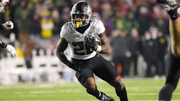 Nov 16, 2024; Madison, Wisconsin, USA;  Oregon Ducks running back Jordan James (20) during the game against the Wisconsin Badgers at Camp Randall Stadium. Mandatory Credit: Jeff Hanisch-Imagn Images