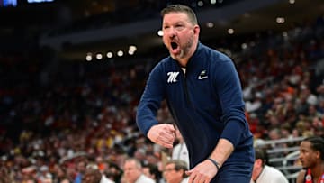 Mar 23, 2025; Milwaukee, WI, USA;  Mississippi Rebels head coach Chris Beard reacts during the first half in the second round of the NCAA Tournament against the Iowa State Cyclones at Fiserv Forum. Mandatory Credit: Benny Sieu-Imagn Images