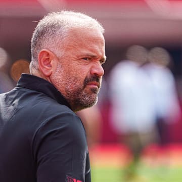 Sep 20, 2025; Lincoln, Nebraska, USA; Nebraska Cornhuskers head coach Matt Rhule walks onto the field before the game against the Michigan Wolverines at Memorial Stadium. Mandatory Credit: Dylan Widger-Imagn Images