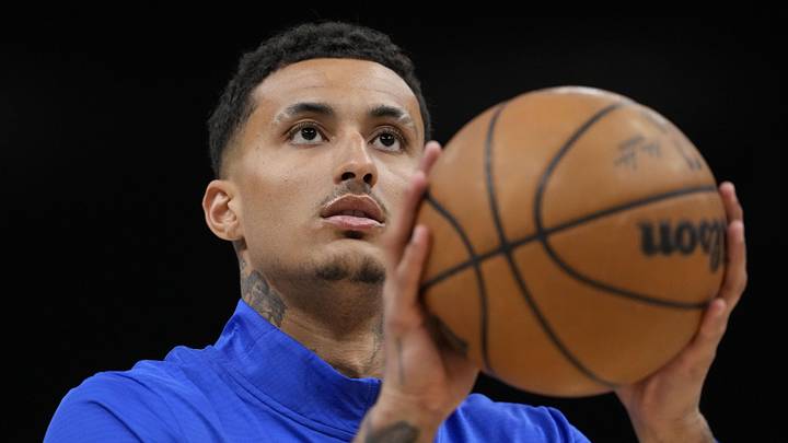 Feb 23, 2025; Milwaukee, Wisconsin, USA;  Milwaukee Bucks forward Kyle Kuzma (18) shoots during warmups prior to the game against the Miami Heat at Fiserv Forum. Mandatory Credit: Jeff Hanisch-Imagn Images