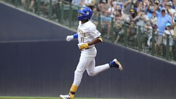 Jul 25, 2025; Milwaukee, Wisconsin, USA; Milwaukee Brewers outfielder Jackson Chourio (11) rounds the bases after hitting a home run against the Miami Marlins in the fourth at American Family Field. Mandatory Credit: Michael McLoone-Imagn Images