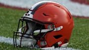 Aug 3, 2023; Canton, Ohio, USA; A Cleveland Browns helmet on the field at Tom Benson Hall of Fame Stadium. Mandatory Credit: Kirby Lee-Imagn Images