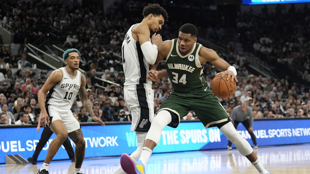 Jan 31, 2025; San Antonio, Texas, USA; Milwaukee Bucks forward Giannis Antetokounmpo (34) drives to the basket against San Antonio Spurs center Victor Wembanyama (1) during the second half at Frost Bank Center. Mandatory Credit: Scott Wachter-Imagn Images