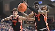Jan 28, 2025; Spokane, Washington, USA; Oregon State Beavers guard Damarco Minor (0) fights for the rebound against Gonzaga Bulldogs forward Graham Ike (13) in the second half at McCarthey Athletic Center. Mandatory Credit: James Snook-Imagn Images
