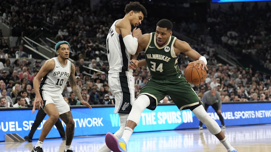 Jan 31, 2025; San Antonio, Texas, USA; Milwaukee Bucks forward Giannis Antetokounmpo (34) drives to the basket against San Antonio Spurs center Victor Wembanyama (1) during the second half at Frost Bank Center. Mandatory Credit: Scott Wachter-Imagn Images