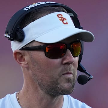 Oct 21, 2023; Los Angeles, California, USA; Southern California Trojans head coach Lincoln Riley watches from the sidelines against the Utah Utes in the first half at United Airlines Field at Los Angeles Memorial Coliseum. Mandatory Credit: Kirby Lee-Imagn Images
