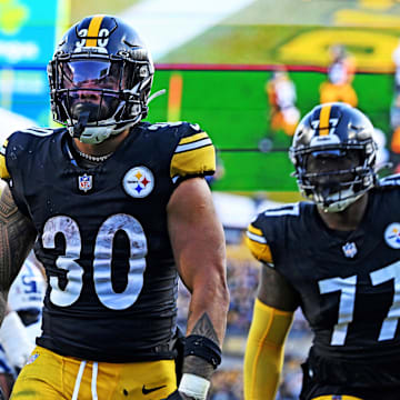Nov 2, 2025; Pittsburgh, Pennsylvania, USA; Pittsburgh Steelers running back Jaylen Warren (30) scroes a touchdown during the second half against the Indianapolis Colts at Acrisure Stadium. Mandatory Credit: Barry Reeger-Imagn Images