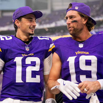 Sep 21, 2025; Minneapolis, Minnesota, USA; Minnesota Vikings quarterback Max Brosmer (12) and wide receiver Adam Thielen (19) following the game against the Cincinnati Bengals at U.S. Bank Stadium. Mandatory Credit: Brad Rempel-Imagn Images