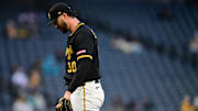 Pittsburgh Pirates starting pitcher Paul Skenes walks to the dugout.