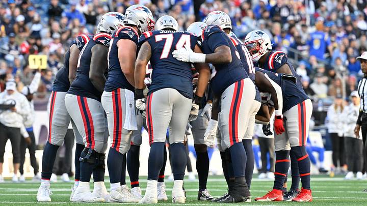 Nov 17, 2024; Foxborough, Massachusetts, USA; The New England Patriots huddle during the second half against the Los Angeles Rams at Gillette Stadium. Mandatory Credit: Eric Canha-Imagn Images