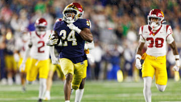 Notre Dame running back Jadarian Price (24) returns a kick for a touchdown in the second half of a NCAA football game against Southern California at Notre Dame Stadium on Saturday, Oct. 18, 2025, in South Bend.