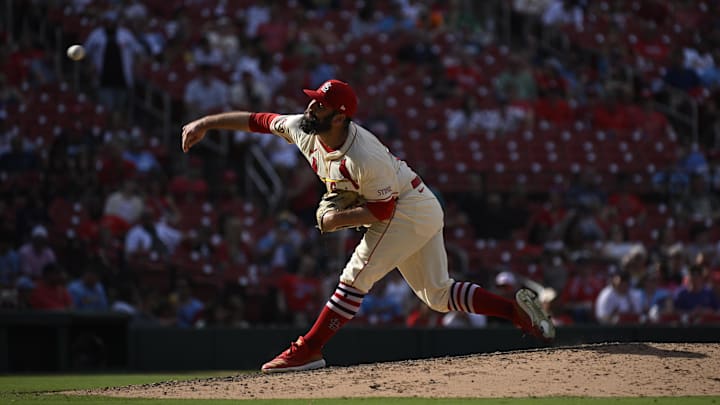 Jun 8, 2024; St. Louis, Missouri, USA; St. Louis Cardinals pitcher Andrew Kittredge (27) throws against the Colorado Rockies during the seventh inning at Busch Stadium. Mandatory Credit: Jeff Le-Imagn Images