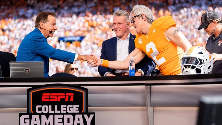 Johnny Knoxville, right, shakes hands with Nick Saban, left, during ESPN’s College GameDay before a college football game between Tennessee and Texas at Neyland Stadium in Knoxville, Tenn. on Sept. 26, 2026.