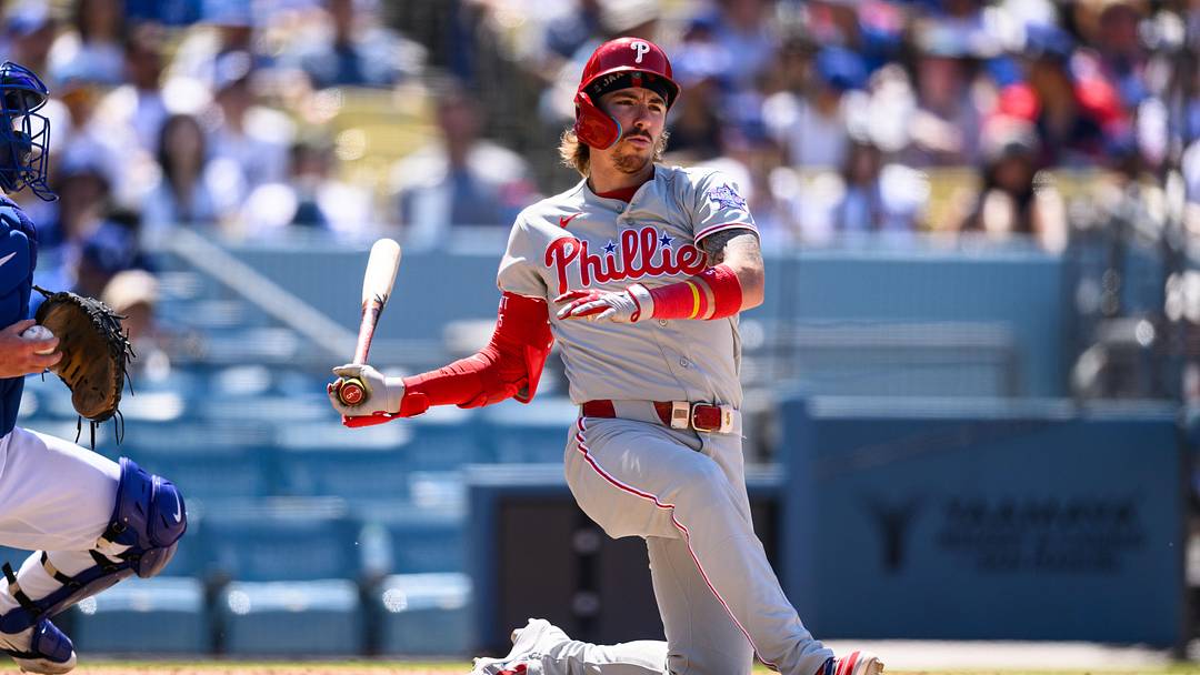 May 31, 2026; Los Angeles, California, USA; Philadelphia Phillies second baseman Bryson Stott (5) swings during the sixth inning against the Los Angeles Dodgers at Dodger Stadium. Mandatory Credit: William Liang-Imagn Images