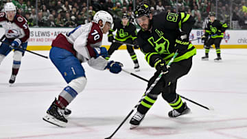 Nov 29, 2024; Dallas, Texas, USA; Dallas Stars center Tyler Seguin (91) and Colorado Avalanche defenseman Sam Malinski (70) in action during the game between the Dallas Stars and the Colorado Avalanche at American Airlines Center. Mandatory Credit: Jerome Miron-Imagn Images