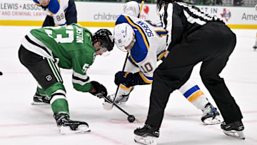 Mar 2, 2025; Dallas, Texas, USA; Dallas Stars center Wyatt Johnston (53) and St. Louis Blues center Brayden Schenn (10) take the face-off during the game between the Dallas Stars and the St. Louis Blues at the American Airlines Center. Mandatory Credit: Jerome Miron-Imagn Images