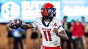 Sep 11, 2025; Winston-Salem, North Carolina, USA; North Carolina State Wolfpack quarterback CJ Bailey (11) throws a pass in first half against Wake Forest Demon Deacons at Allegacy Federal Credit Union Stadium. Mandatory Credit: Luke Jamroz-Imagn Images