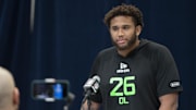 Purdue University offensive lineman Marcus Mbow (OL26) answers questions 