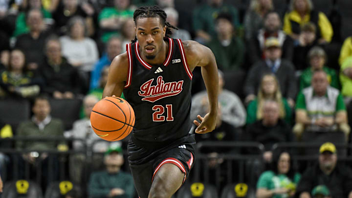 Mar 4, 2025; Eugene, Oregon, USA; Indiana Hoosiers forward Mackenzie Mgbako (21) dribbles the ball against the Oregon Ducks during the second half at Matthew Knight Arena. Mandatory Credit: Craig Strobeck-Imagn Images