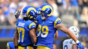 Sep 28, 2025; Inglewood, California, USA; Los Angeles Rams wide receiver Davante Adams (17) celebrates with tight end Tyler Higbee (89) after a touchdown in the first half against the Indianapolis Colts at SoFi Stadium. Mandatory Credit: Jayne Kamin-Oncea-Imagn Images