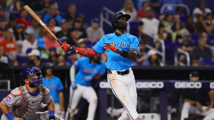 Jul 21, 2024; Miami, Florida, USA; Miami Marlins designated hitter Jazz Chisholm Jr. (2) hits a three-run home run against the New York Mets during the fourth inning at loanDepot Park. Mandatory Credit: Sam Navarro-USA TODAY Sports