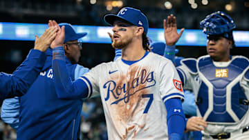 Apr 8, 2025; Kansas City, Missouri, USA; Kansas City Royals shortstop Bobby Witt Jr. (7) celebrates after the game against the Minnesota Twins at Kauffman Stadium. Mandatory Credit: William Purnell-Imagn Images