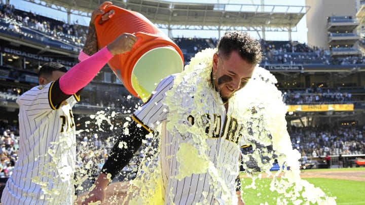 Jun 12, 2024; San Diego, California, USA; San Diego Padres center fielder Jackson Merrill (3) is doused after hitting a walk-off home run against the Oakland Athletics at Petco Park. Mandatory Credit: Orlando Ramirez-USA TODAY Sports