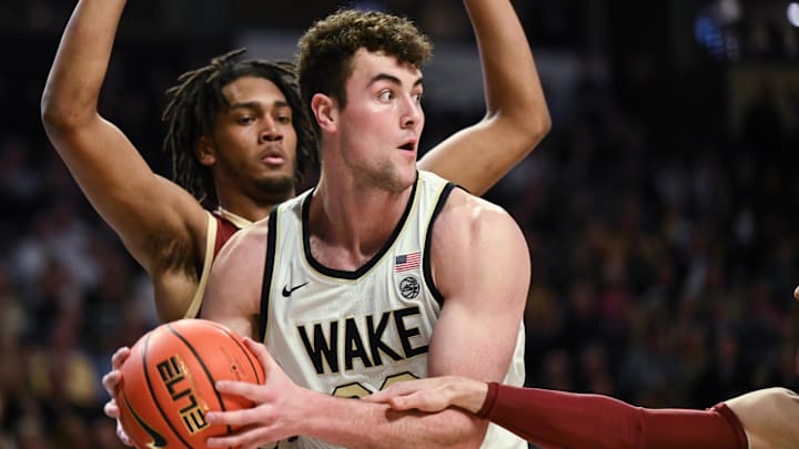 Feb 28, 2023; Winston-Salem, North Carolina, USA; Wake Forest Demon Deacons forward Matthew Marsh (33) looks to pass against the Boston College Eagles during the first half at Lawrence Joel Veterans Memorial Coliseum. Mandatory Credit: William Howard-Imagn Images