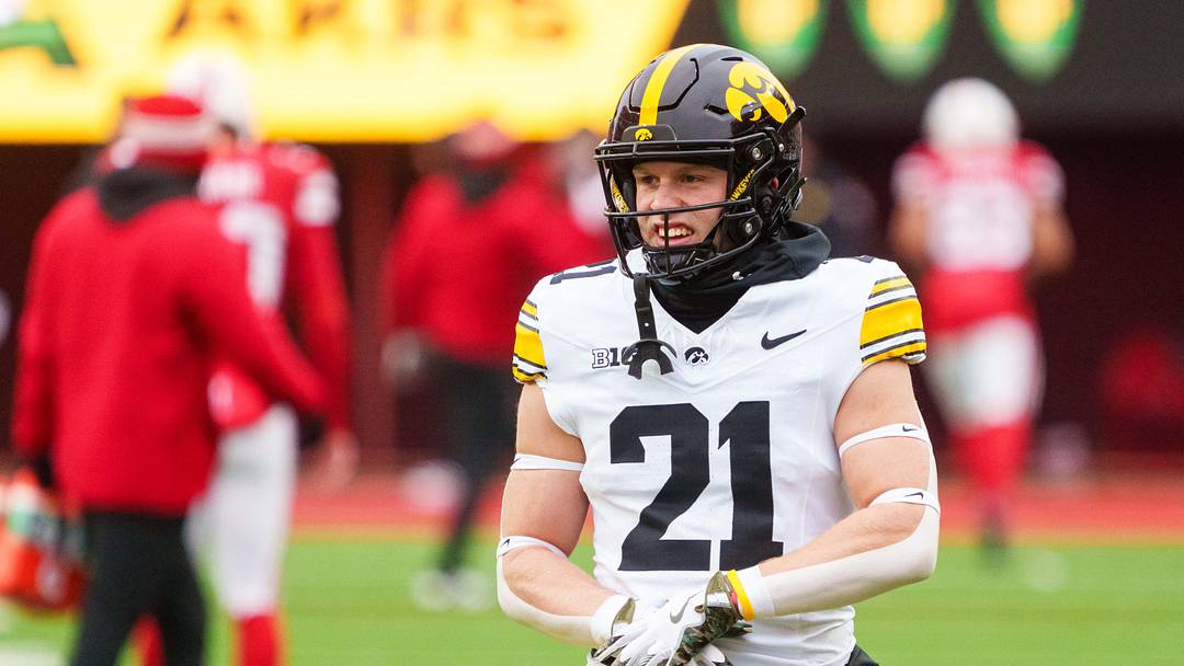 Nov 28, 2025; Lincoln, Nebraska, USA; Iowa Hawkeyes wide receiver Kaden Wetjen (21) warms up before the game against the Nebraska Cornhuskers at Memorial Stadium. Mandatory Credit: Dylan Widger-Imagn Images