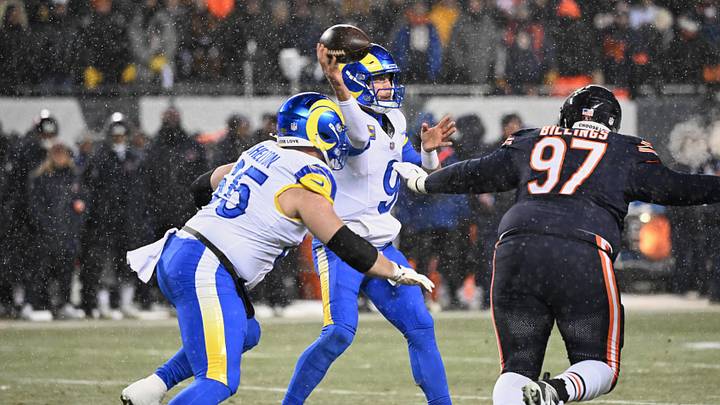 Jan 18, 2026; Chicago, IL, USA; Los Angeles Rams quarterback Matthew Stafford (9) throws a pass against Chicago Bears defensive tackle Andrew Billings (97) during the first quarter of an NFC Divisional Round game at Soldier Field. Mandatory Credit: Matt Marton-Imagn Images