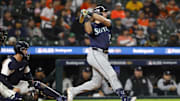 Oct 7, 2025; Detroit, Michigan, USA; Seattle Mariners catcher Cal Raleigh (29) hits a two-run home run in the ninth inning against the Detroit Tigers during game three of the ALDS round for the 2025 MLB playoffs at Comerica Park.
