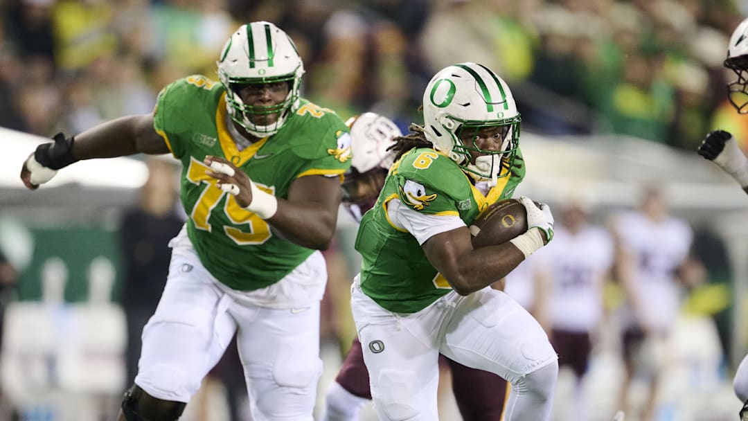 Nov 14, 2025; Eugene, Oregon, USA; Oregon Ducks running back Noah Whittington (6) breaks away during the first half for a touchdown against the Minnesota Golden Gophers at Autzen Stadium. Mandatory Credit: Troy Wayrynen-Imagn Images Nov 14, 2025; Eugene, Oregon, USA; Oregon Ducks running back Noah Whittington (6) breaks away during the first half for a touchdown against the Minnesota Golden Gophers at Autzen Stadium. Mandatory Credit: Troy Wayrynen-Imagn Images