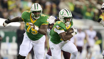 Nov 14, 2025; Eugene, Oregon, USA; Oregon Ducks running back Noah Whittington (6) breaks away during the first half for a touchdown against the Minnesota Golden Gophers at Autzen Stadium. Mandatory Credit: Troy Wayrynen-Imagn Images