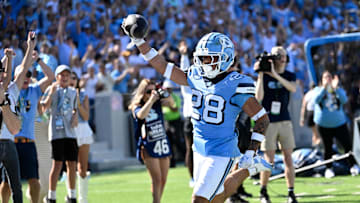 Oct 12, 2024; Chapel Hill, North Carolina, USA; North Carolina Tar Heels running back Omarion Hampton (28) runs for a touchdown in the third quarter at Kenan Memorial Stadium. Mandatory Credit: Bob Donnan-Imagn Images