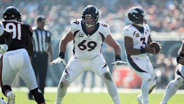 Oct 1, 2023; Chicago, Illinois, USA;  Denver Broncos tackle Mike McGlinchey (69) blocks against the Chicago Bears.