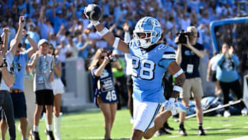 Oct 12, 2024; Chapel Hill, North Carolina, USA; North Carolina Tar Heels running back Omarion Hampton (28) runs for a touchdown in the third quarter at Kenan Memorial Stadium. Mandatory Credit: Bob Donnan-Imagn Images