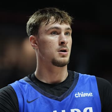 Jul 12, 2025; Las Vegas, NV, USA; Dallas Mavericks forward Cooper Flagg (32) looks on against the San Antonio Spurs in the second quarter of their game at Thomas & Mack Center. Mandatory Credit: Candice Ward-Imagn Images