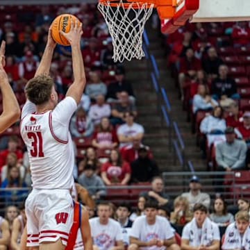 Wisconsin Badgers junior Nolan Winter slams home two points against the UW-Platteville Pioneers in an exhibition game at the Kohl Center on October 29, 2025.