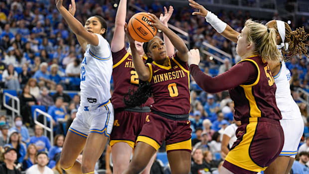  eb 2, 2025; Los Angeles, California, USA;Minnesota Golden Gophers guard Alexsia Rose (0) grabs a rebound from UCLA Bruins fo