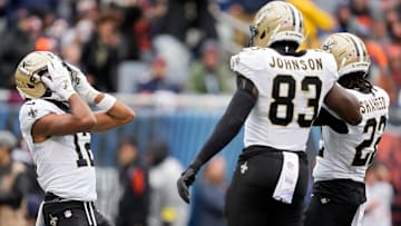 New Orleans Saints WR Chris Olave (12) celebrates a touchdown reception with WR Rashid Shaheed (22) and TE Juwan Johnson (83) on Oct. 19, 2025.
